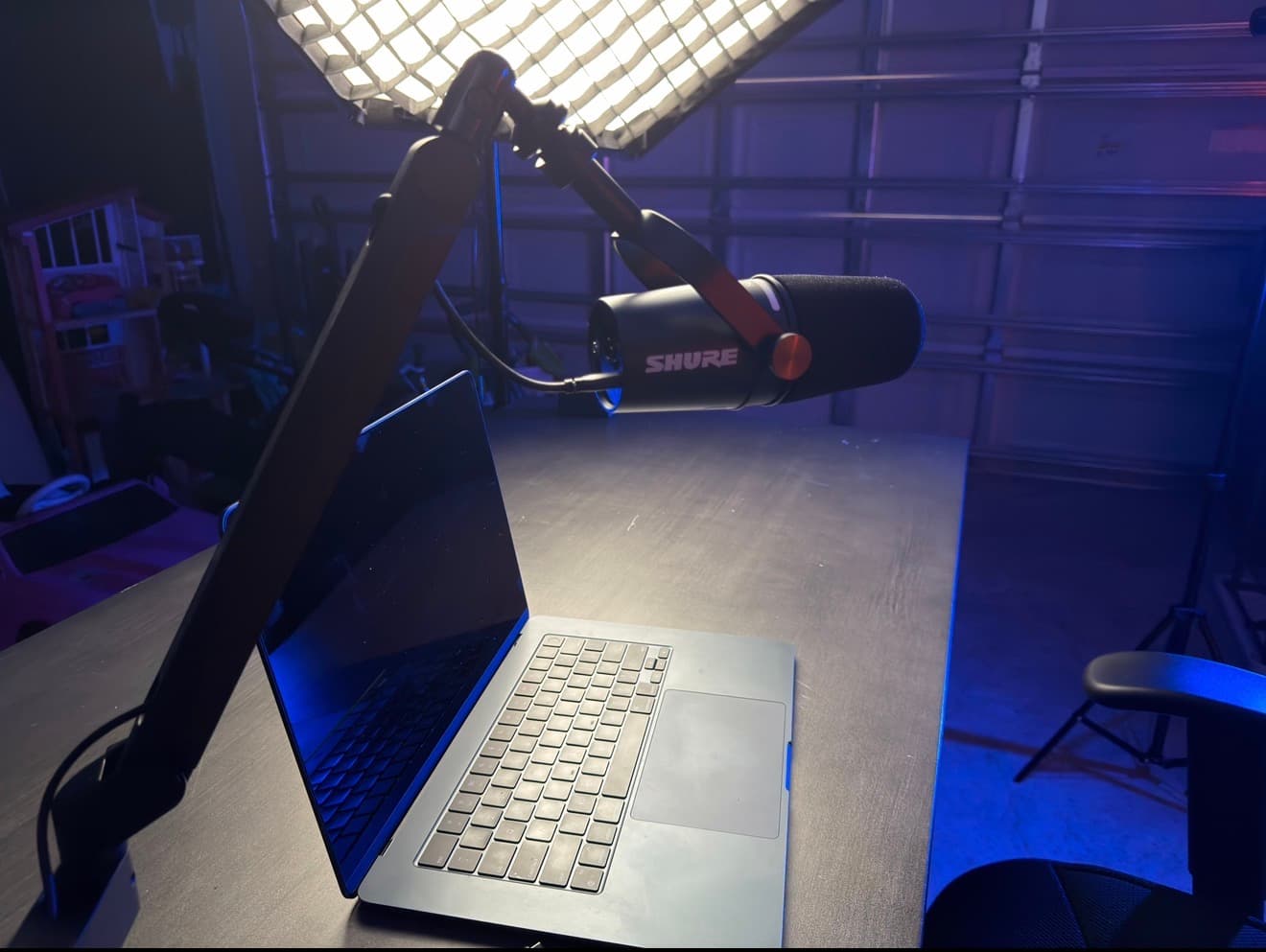 Shure MV7+ and MacBook at the creator desk